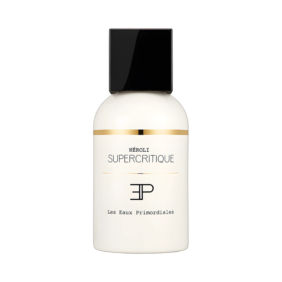 LES EAUX PRIMORDIALES Néroli Supercritique Eau de Parfum 50ml — flacon blanc laqué liseré or sur fond blanc, floral gourmand fleur d'oranger, parfum niche français