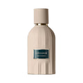 AMOUAGE Outlands Extrait de Parfum 100ml — flacon beige côtelé sur fond blanc, parfum oriental boisé de niche d'Oman