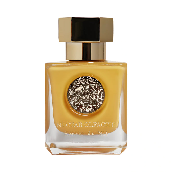 NECTAR OLFACTIF Secret du Nil Extrait de Parfum 100 ml — flacon cubique à la laque couleur miel et bouchon doré hexagonal, sur fond blanc