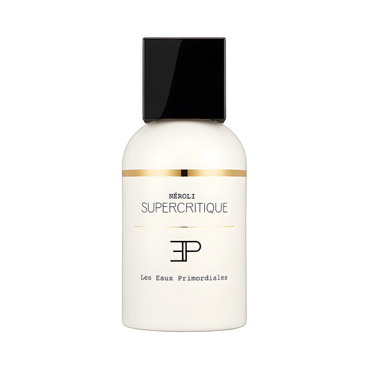 LES EAUX PRIMORDIALES Néroli Supercritique Eau de Parfum 50ml — flacon blanc laqué liseré or sur fond blanc, floral gourmand fleur d'oranger, parfum niche français
